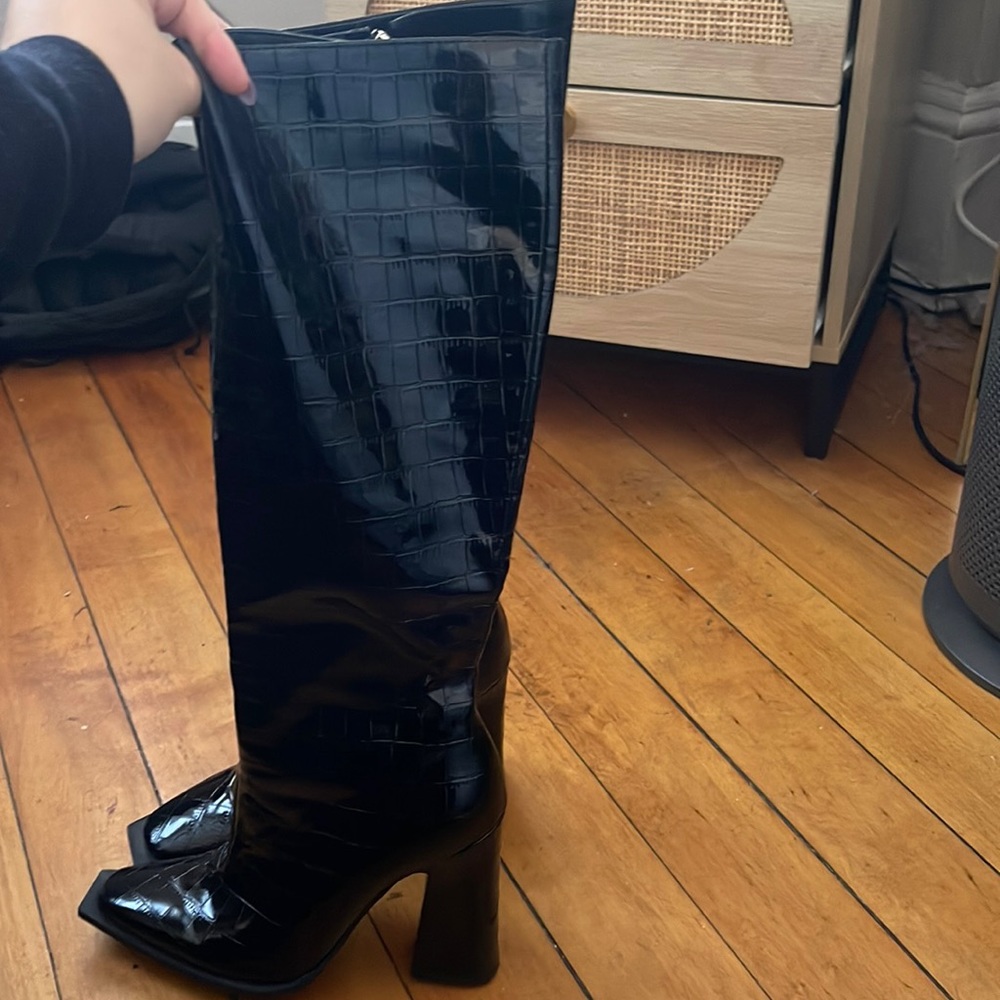 Black knee high patent leather boots